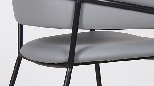 Curved Backrest Faux Leather Upholstered Chair