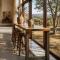 Modern Rustic Style Indoor Bar Table Perfect For Hotel And Resort Spaces