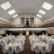 Luxury Event Table Decor With White Linens And Floral Arrangements For Hotel Ballroom