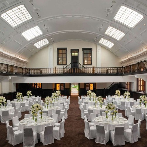 Luxury Event Table Decor With White Linens And Floral Arrangements For Hotel Ballroom