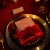 Elegant Floral Centerpieces With Candles And Red Linens For Hotel Banquet Tables And Events