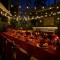 Elegant Floral Centerpieces With Candles And Red Linens For Hotel Banquet Tables And Events