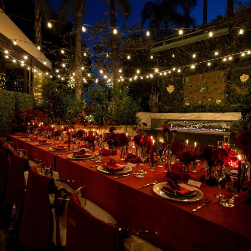 Elegant Floral Centerpieces With Candles And Red Linens For Hotel Banquet Tables And Events
