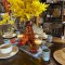 Elegant Floral Centerpieces With Candles And Red Linens For Hotel Banquet Tables And Events