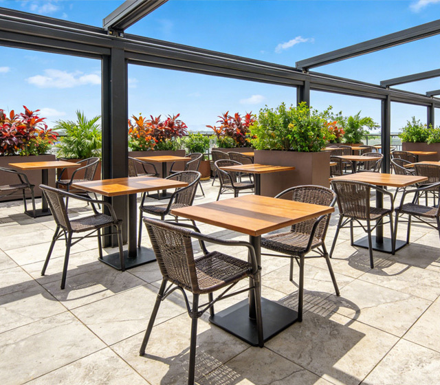 Outdoor dining chairs on a terrace