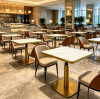What is the most durable tabletop material for busy restaurants?