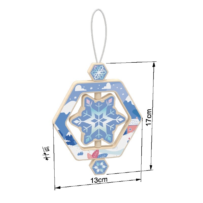 Child holding wooden snowflake spinning ornament