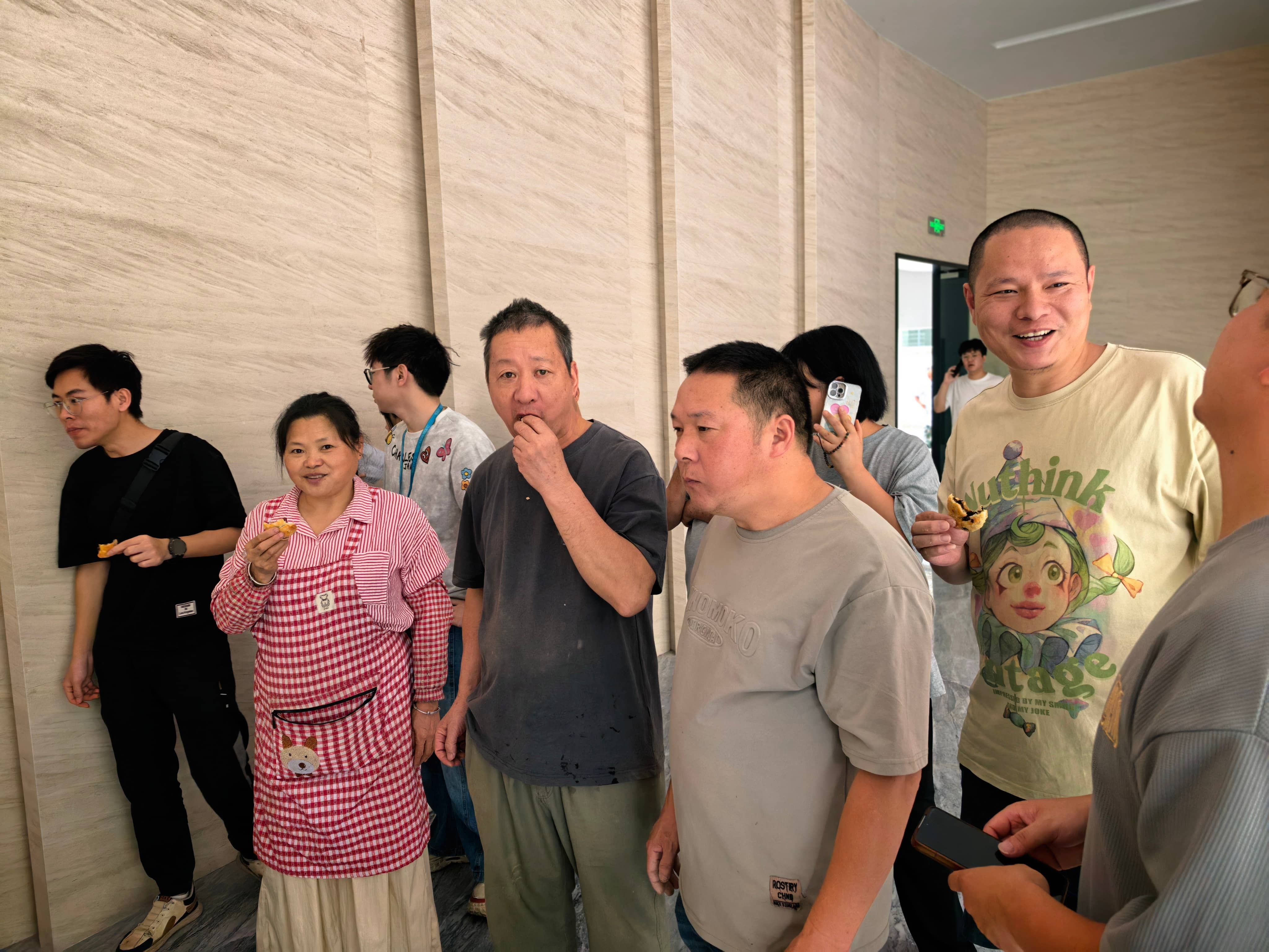 Workshop supervisors and production team at KIDMERRY wooden toy factory during Mid-Autumn Festival