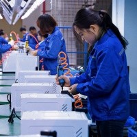 Kangye engineer inspecting manufacturing quality
