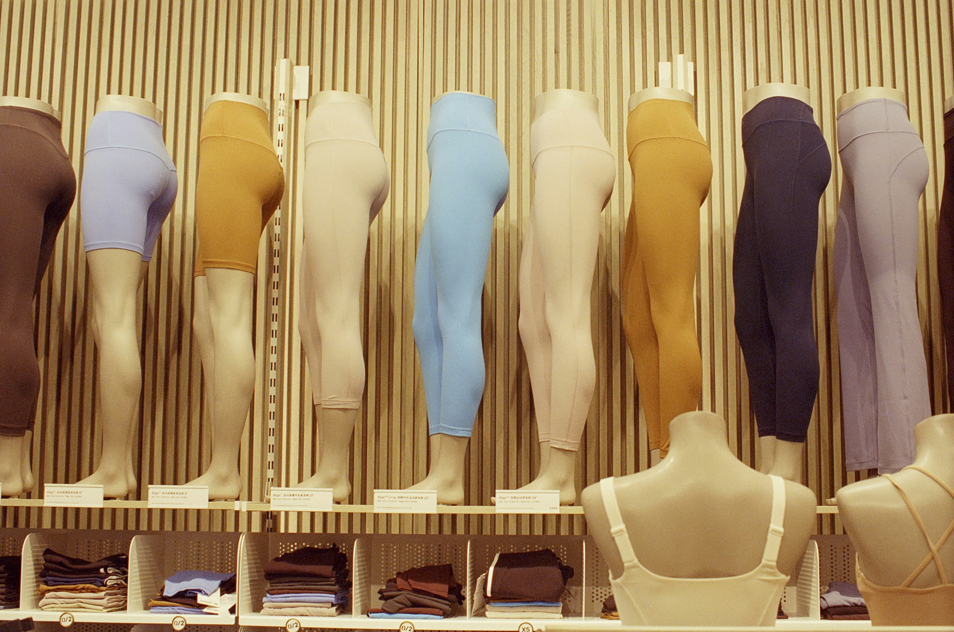 A collection of yoga wear in various 2026 trend colors.