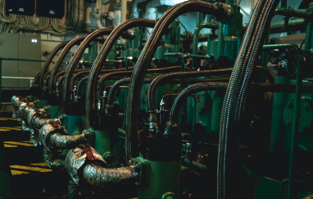 A marine diesel generator in the engine room of a ship