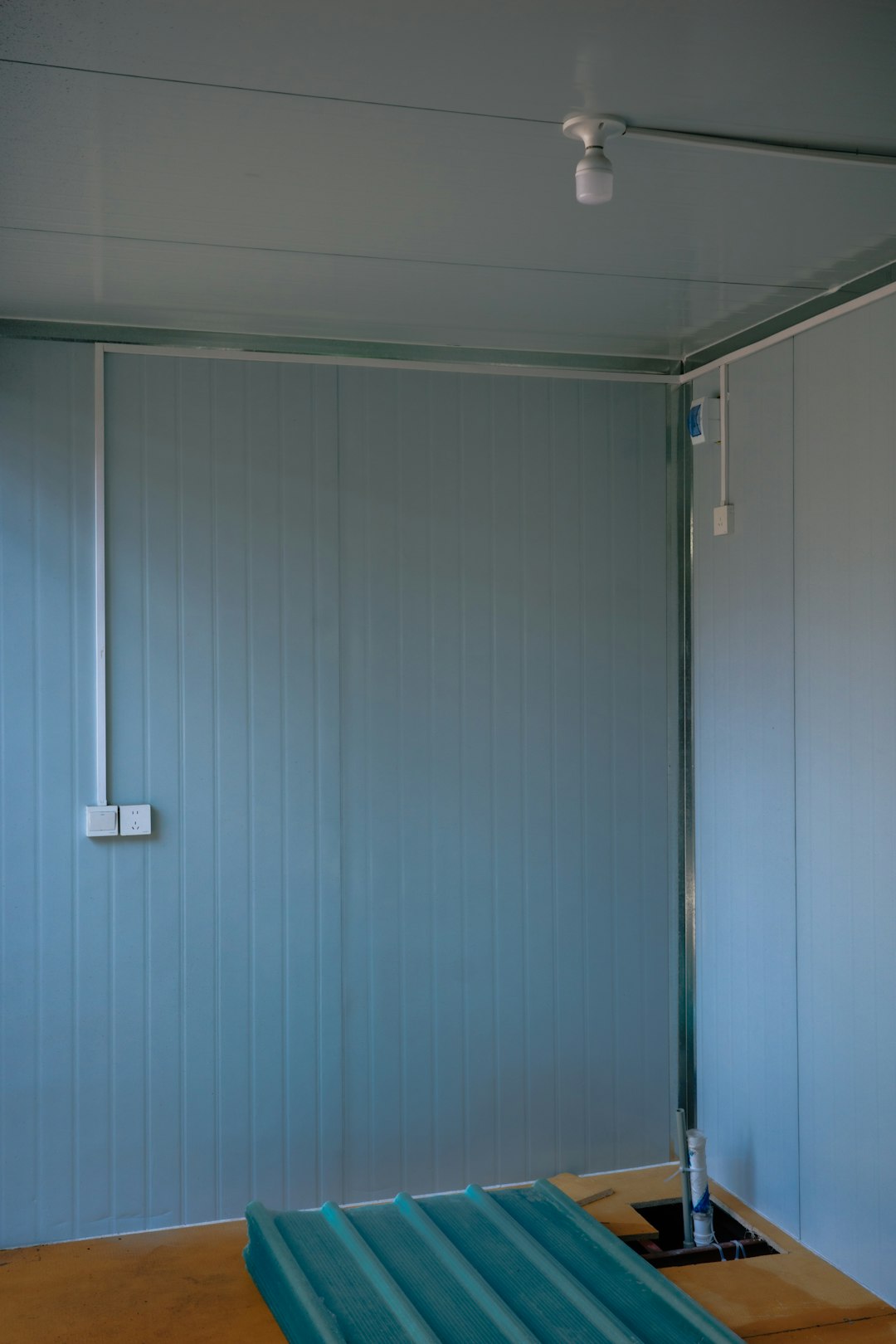 A wall-mounted Automatic Transfer Switch (ATS) in a utility room
