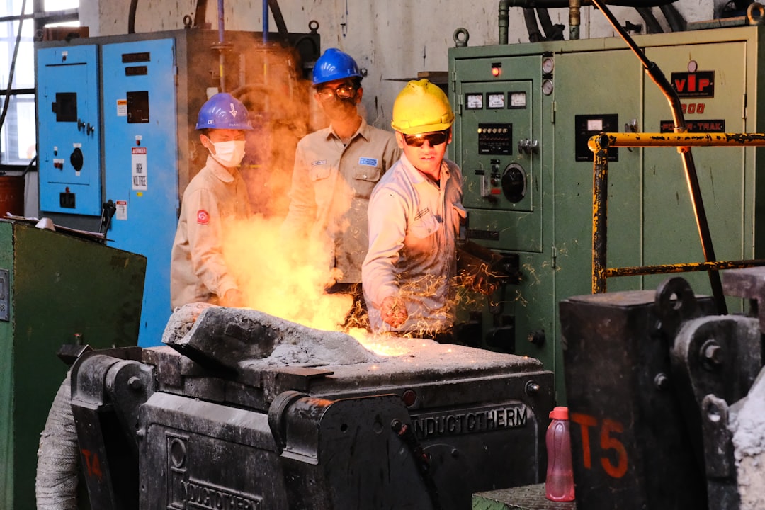 Engineers performing load bank testing on a large diesel generator