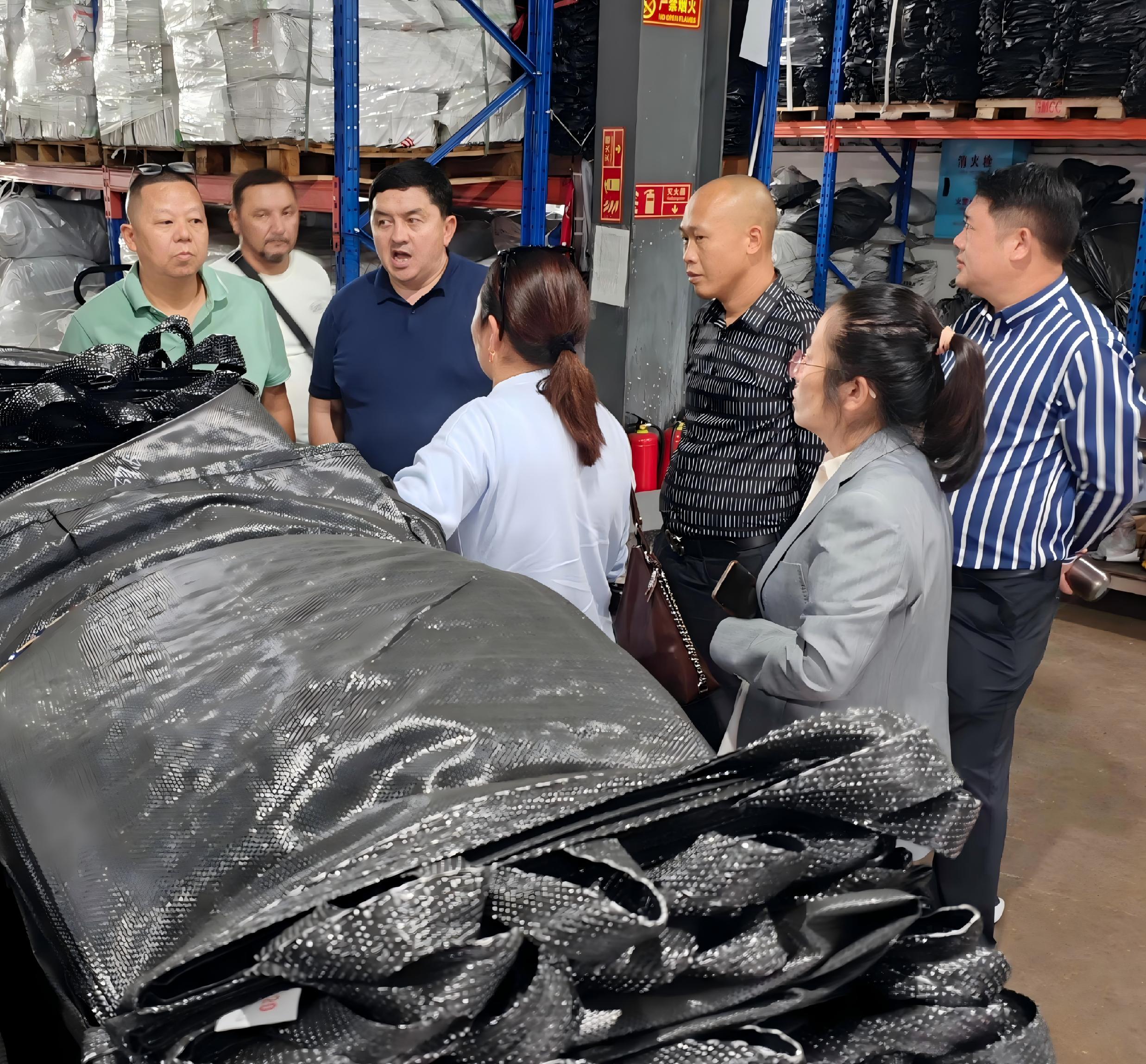 Kazakhstan clients visit HOKBG factory to know Anti-UV grow bags for trees planting