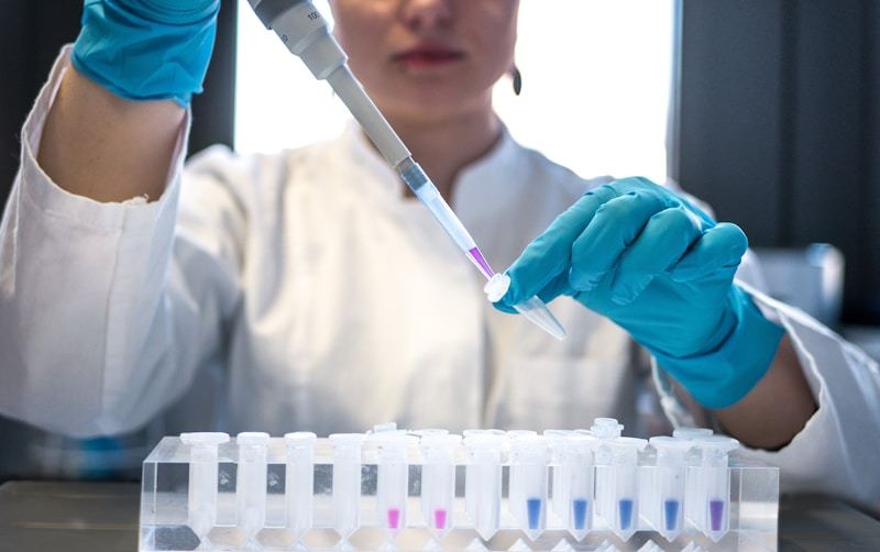 Scientist conducting supplement quality analysis in laboratory