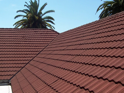 Resort building using durable stone coated metal roofing sheets