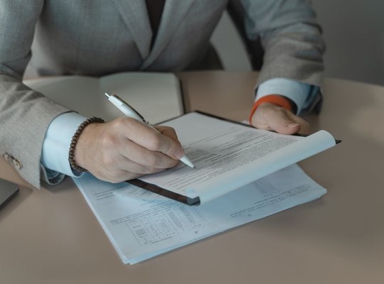 Customs broker reviewing export documents for Dubai customs pre-approval