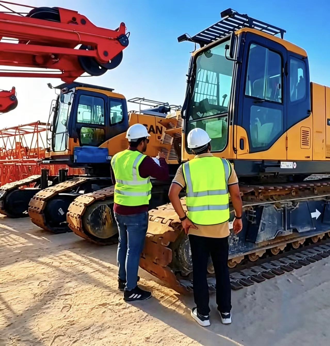 Construction machinery clearing customs at an overseas port terminal