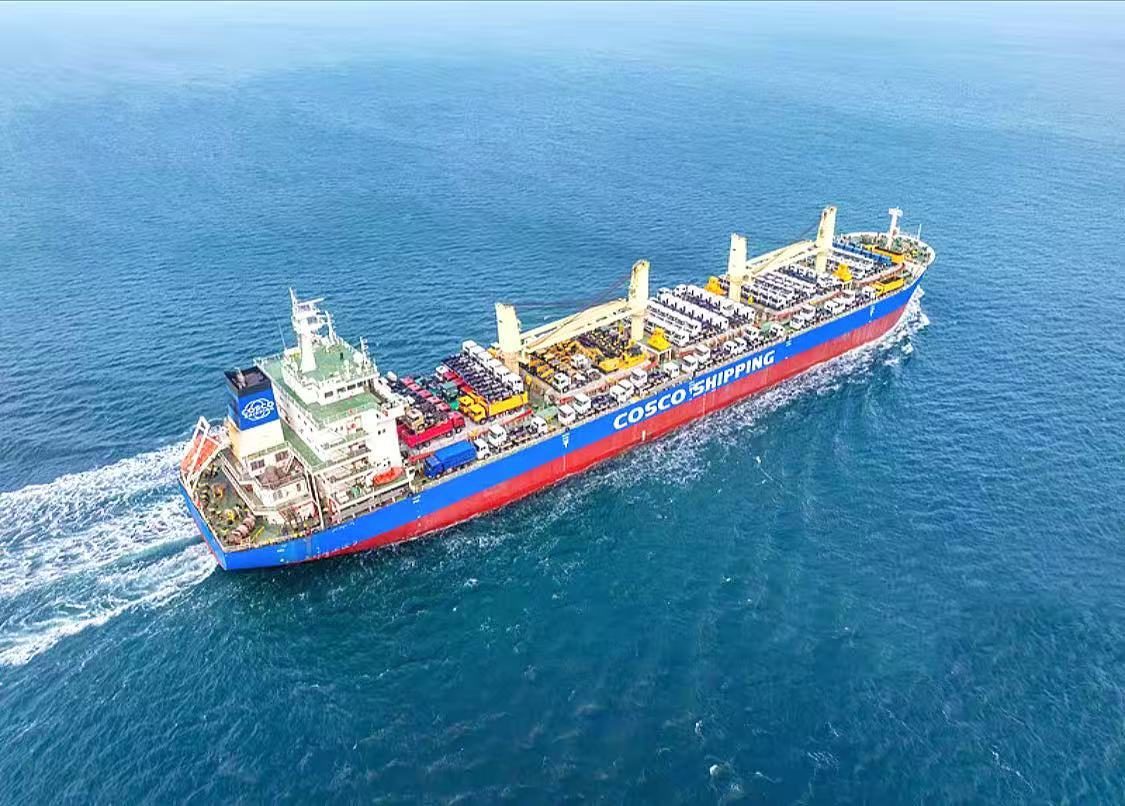 Breakbulk cargo ship sailing on the open sea during ocean transit
