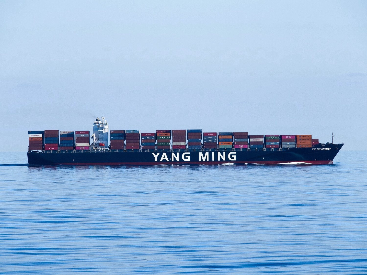 A container ship at sea approaching the Suez Canal transit corridor