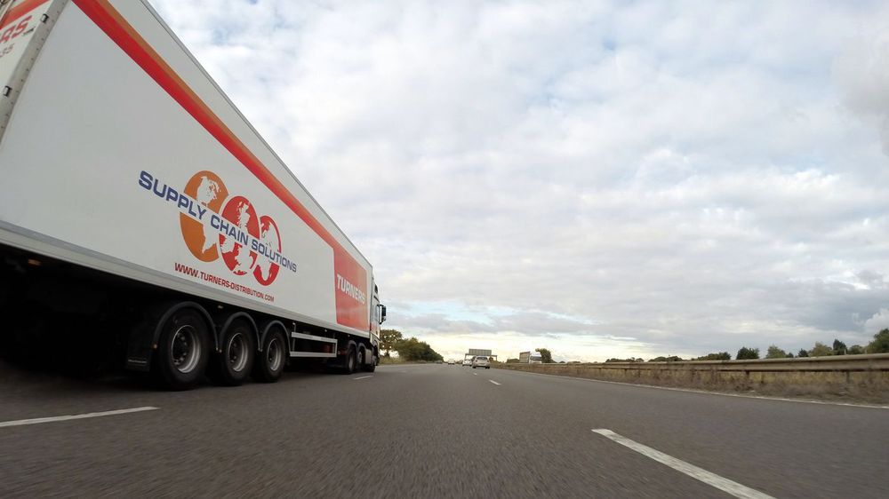 Devanning, clearance and final-mile truck delivery complete the door-to-door chain.