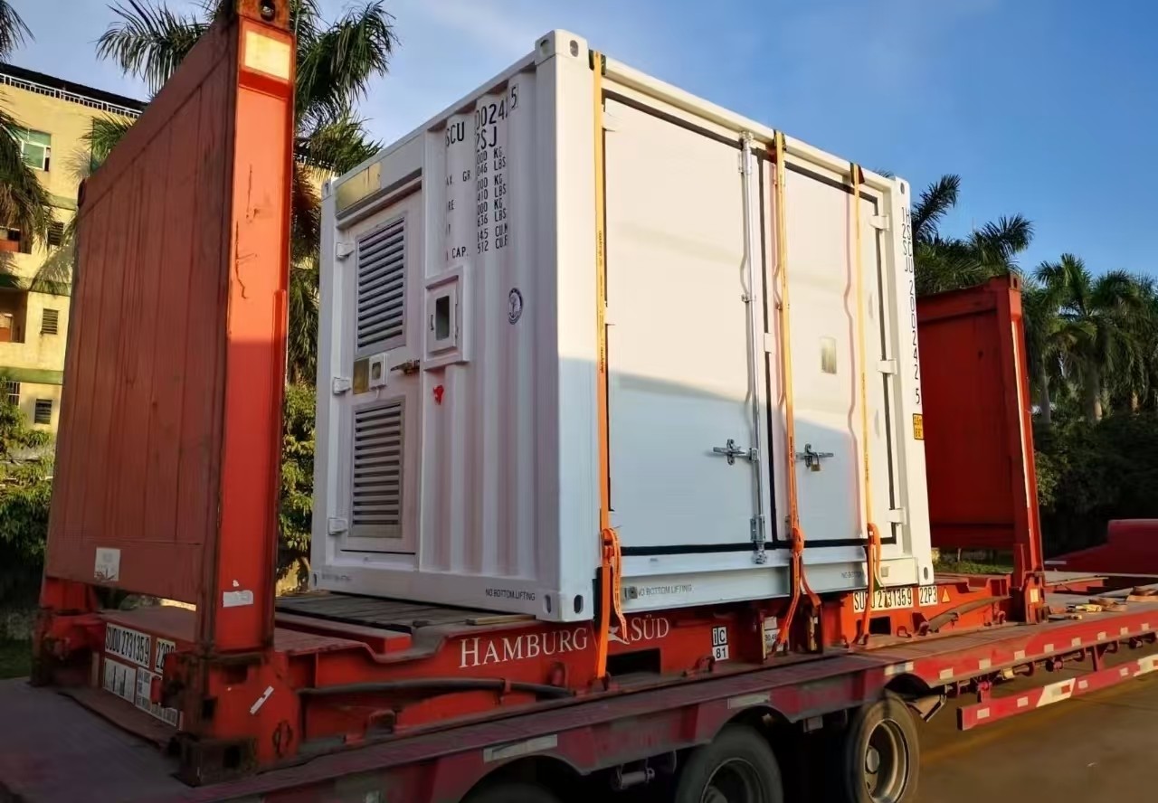A large generator set being lifted onto a vessel for export