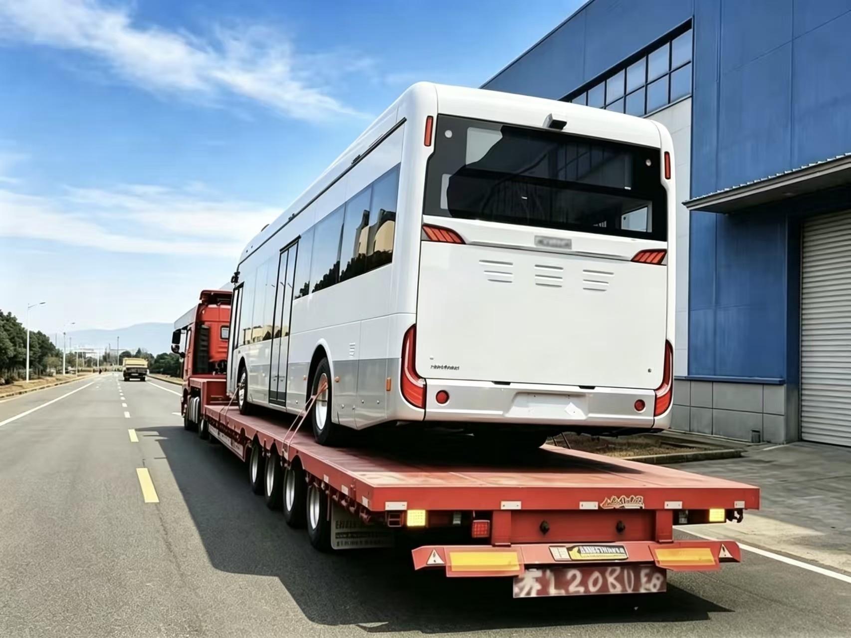 Bus loaded on a trailer for domestic road transport