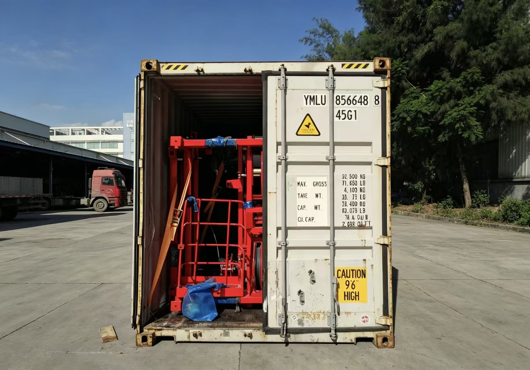 A yard crane positioning containers during terminal handling