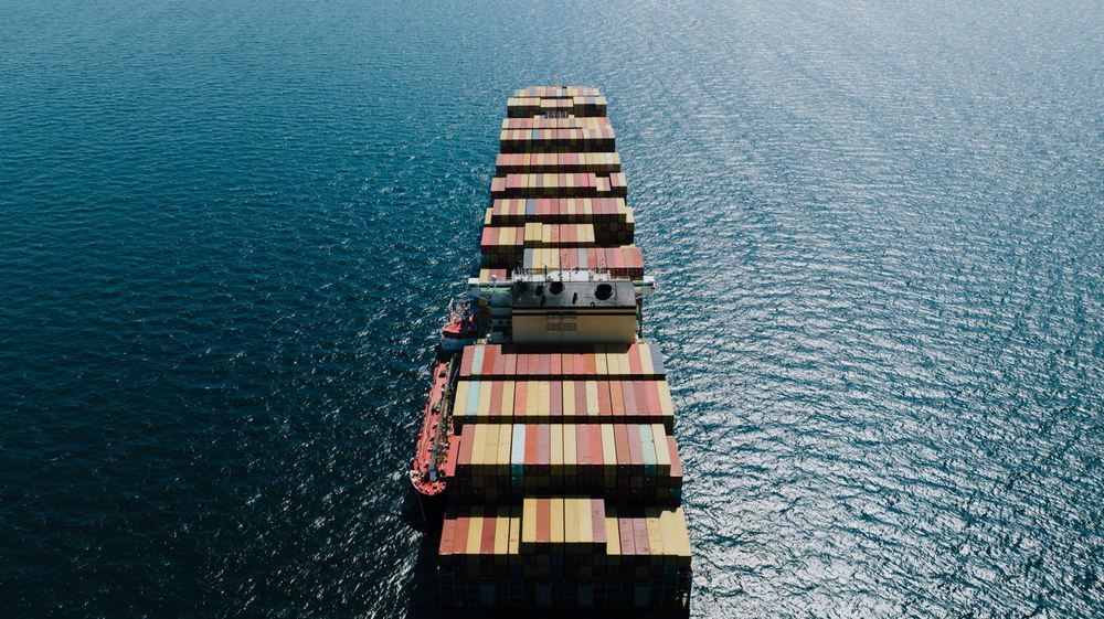 Fully loaded container ship under way on the open sea