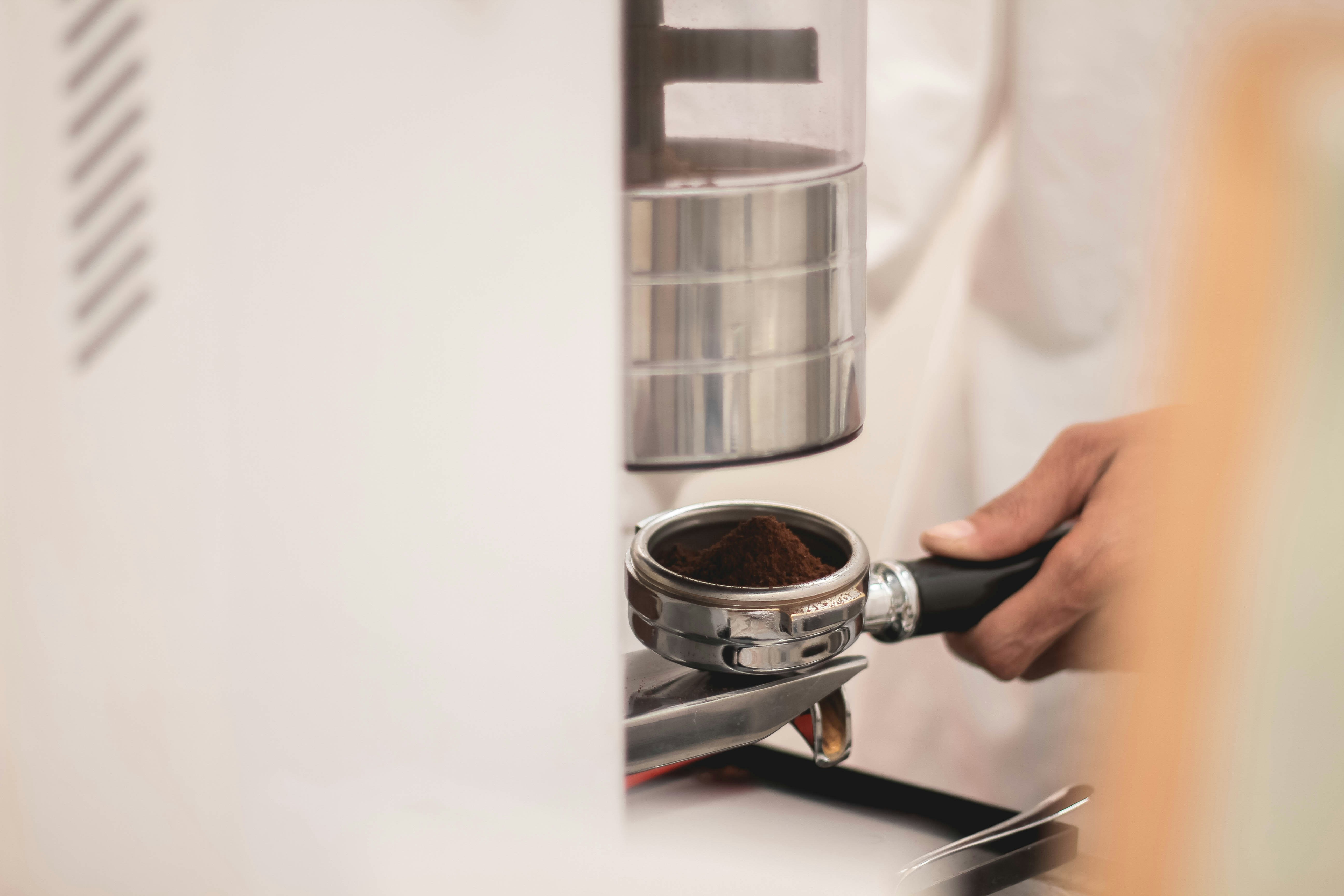A perfectly mirror-polished stainless steel coffee machine portafilter