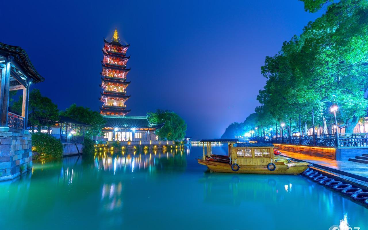Night view of Wuzhen Xizha (West Gate) in Zhejiang, China