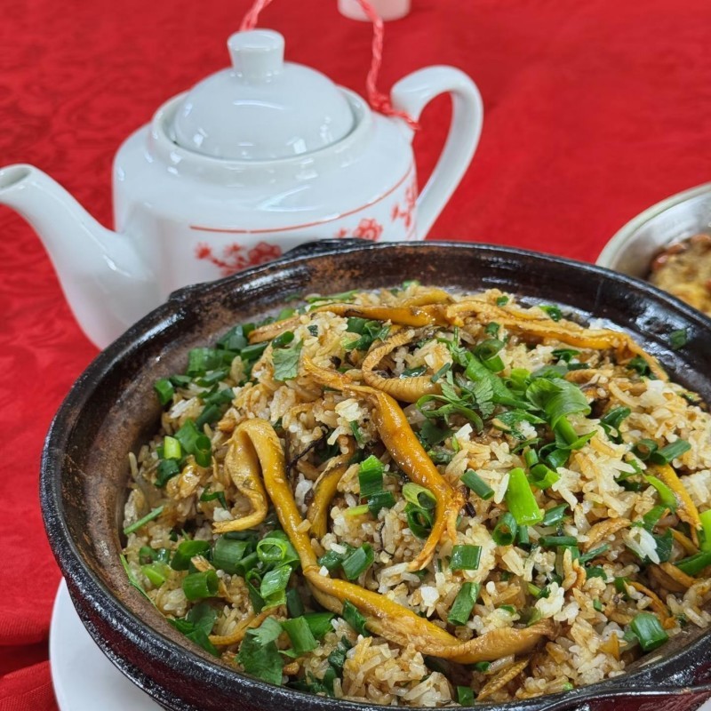 In the morning, stroll through Chikan Ancient Town to admire the continuous arcade buildings. In the afternoon, delve into the Kaiping Diaolou clusters (Zili Village or Liyuan) to explore the UNESCO World Heritage site. Dinner features the special "Taishan Eel Rice," a taste of intangible culinary heritage.