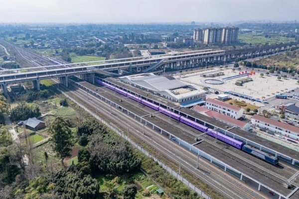 The purple scenic train rolling through southwest China's mountains