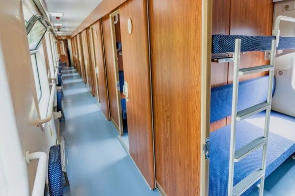 Soft sleeper cabin with tea table and storage