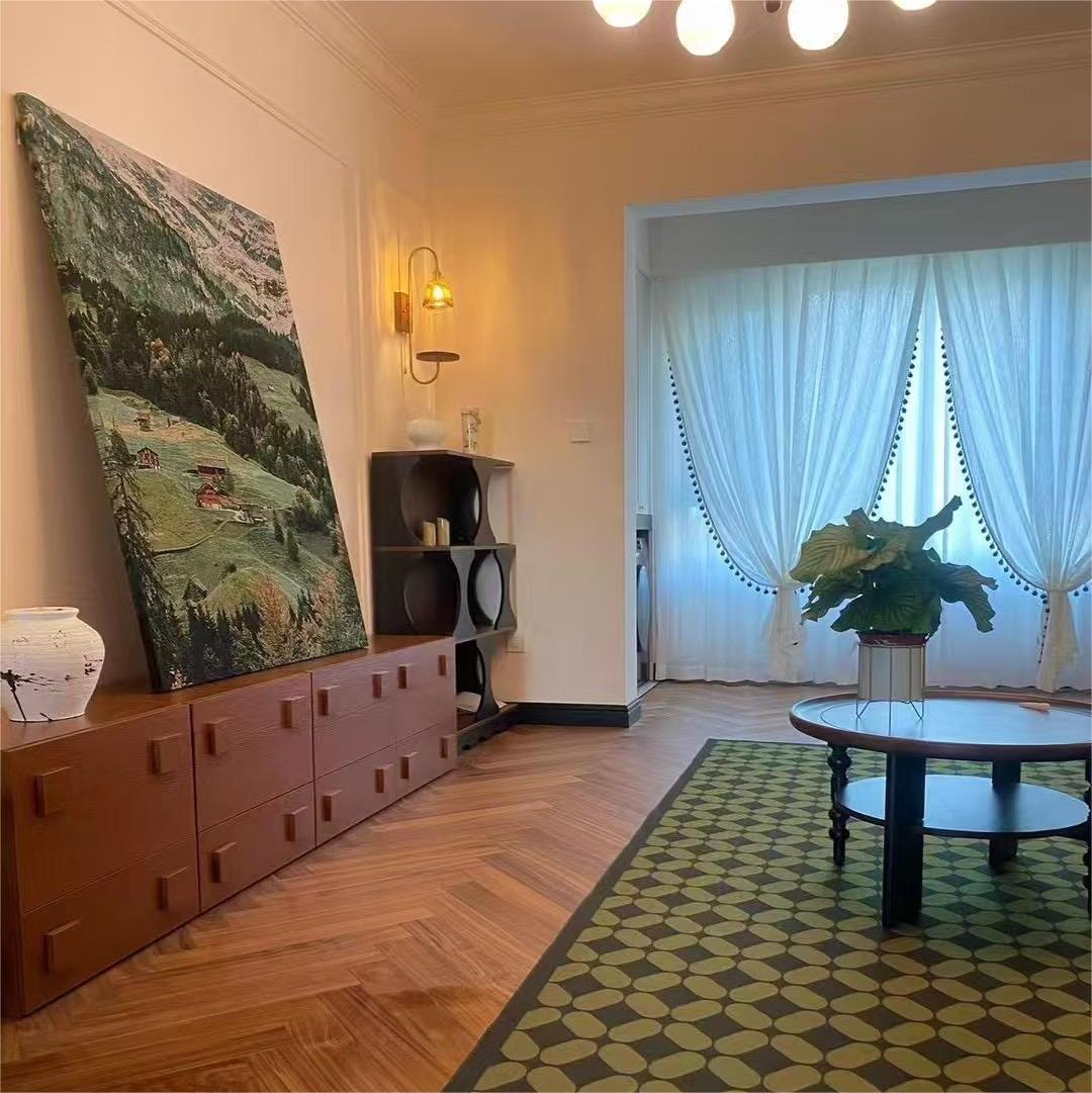 Warm Walnut Herringbone Flooring for an Amsterdam Mid-Century Modern Apartment