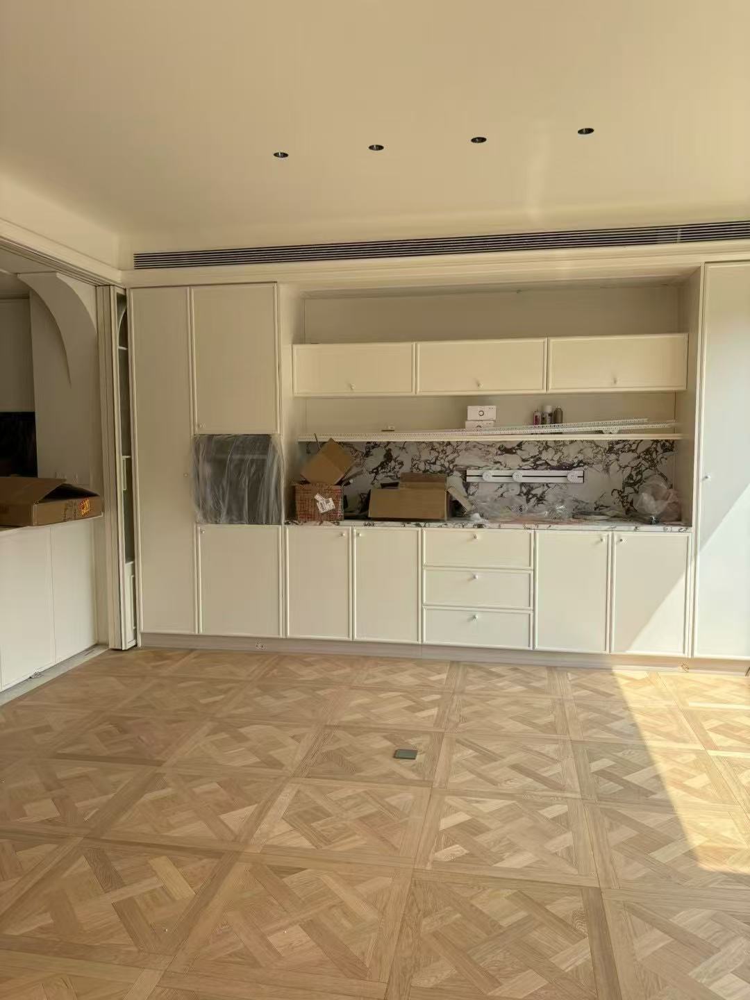 Engineered oak Versailles parquet panel flooring installed in a classic contemporary estate in Seoul, South Korea, featuring warm natural oak tone with brushed UV lacquer finish