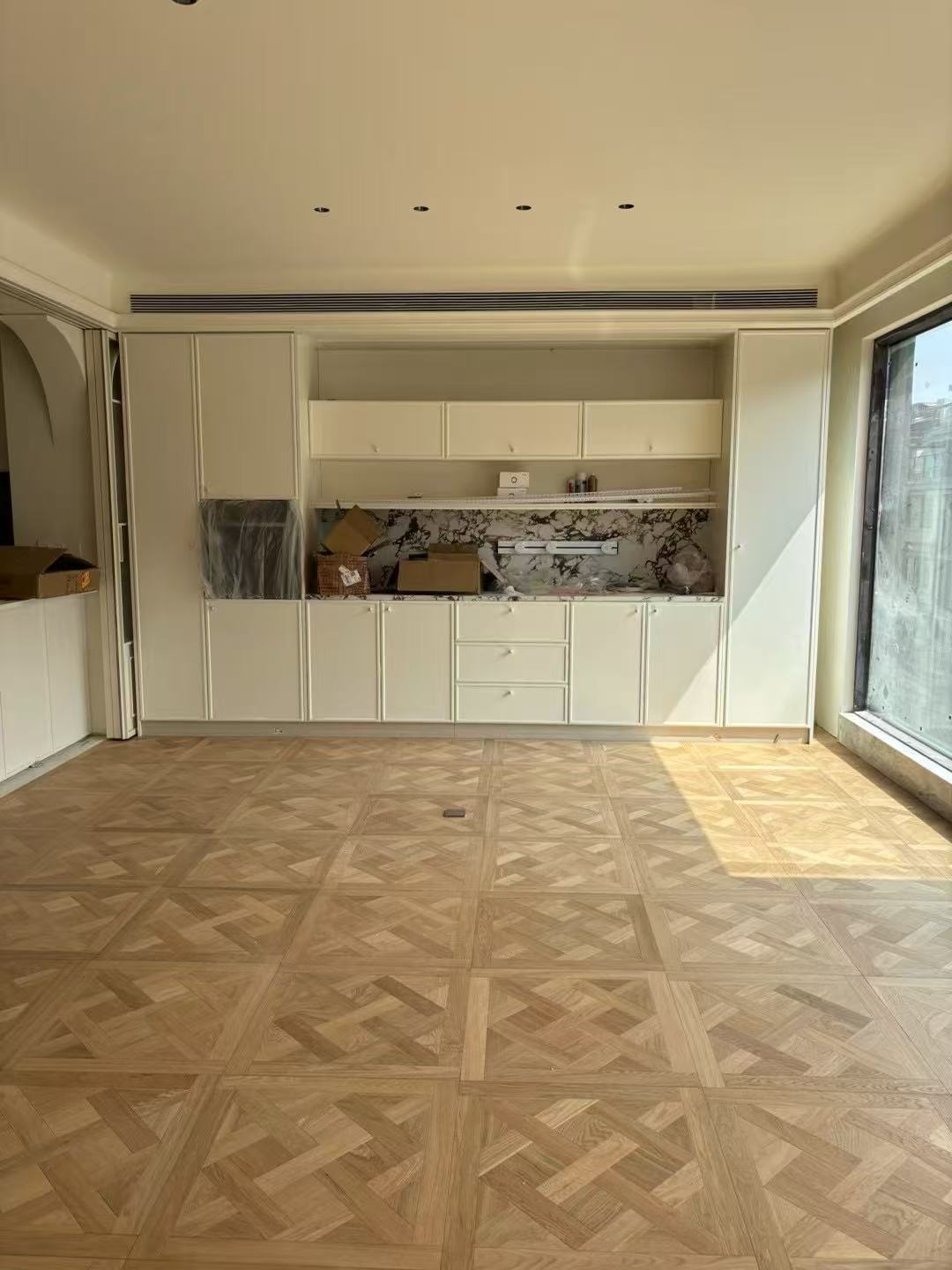 Engineered oak Versailles parquet panel flooring installed in a classic contemporary estate in Seoul, South Korea, featuring warm natural oak tone with brushed UV lacquer finish