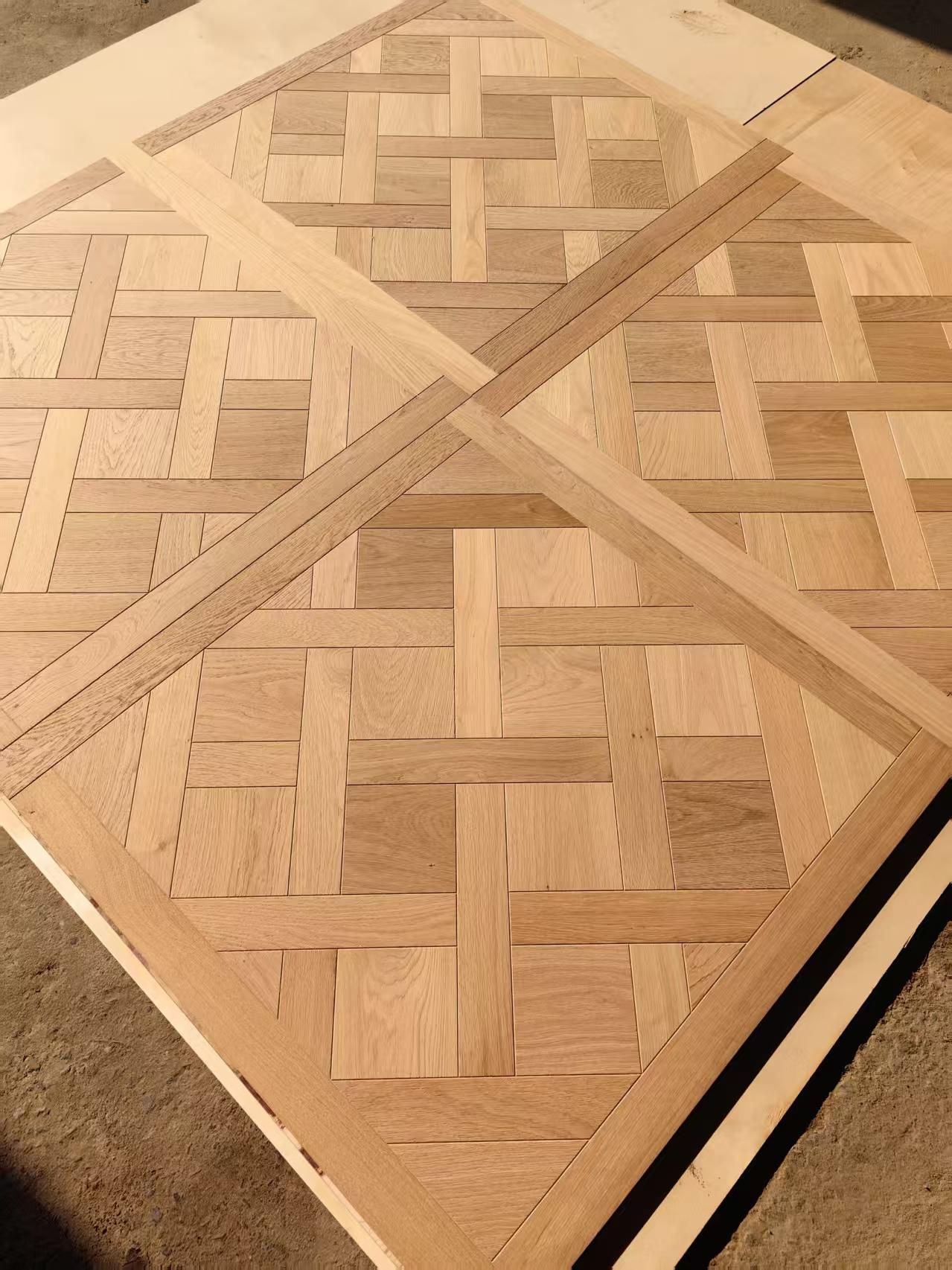 Close-up of brushed warm natural oak wood grain texture with UV lacquer surface finish, 15/4×800×800mm engineered Versailles parquet panel flooring detail