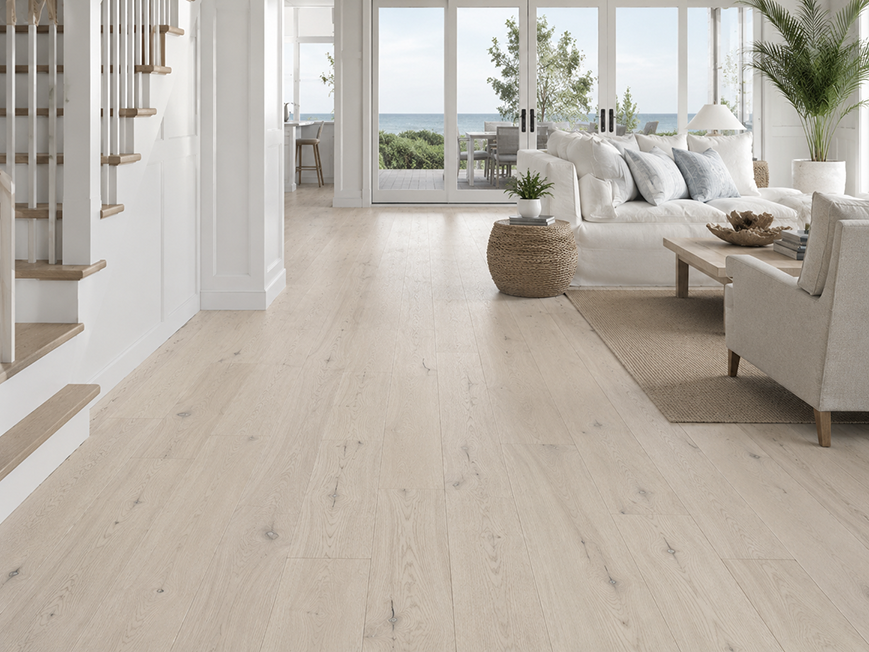 AM-16 ivory white oak flooring in coastal Hamptons interior with rattan and jute accents