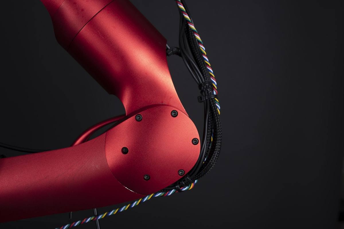 Humanoid robot arm detail. Application image, not a product specification. Photo: Mathew Schwartz / Unsplash.