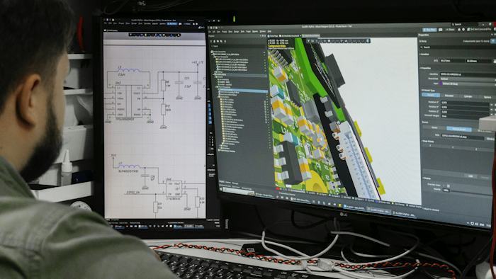 Engineer reviewing an electronic circuit-board design