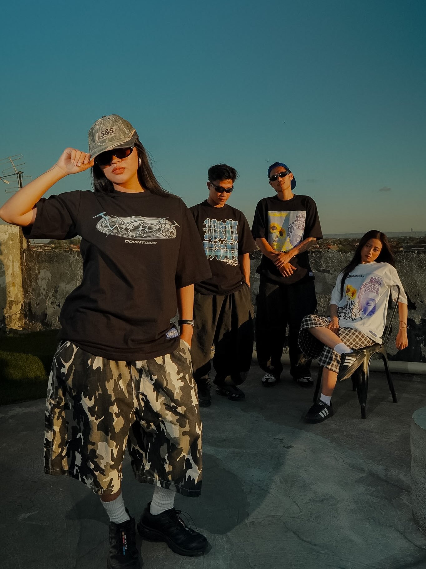 Streetwear models wearing custom denim styles in a graded size range