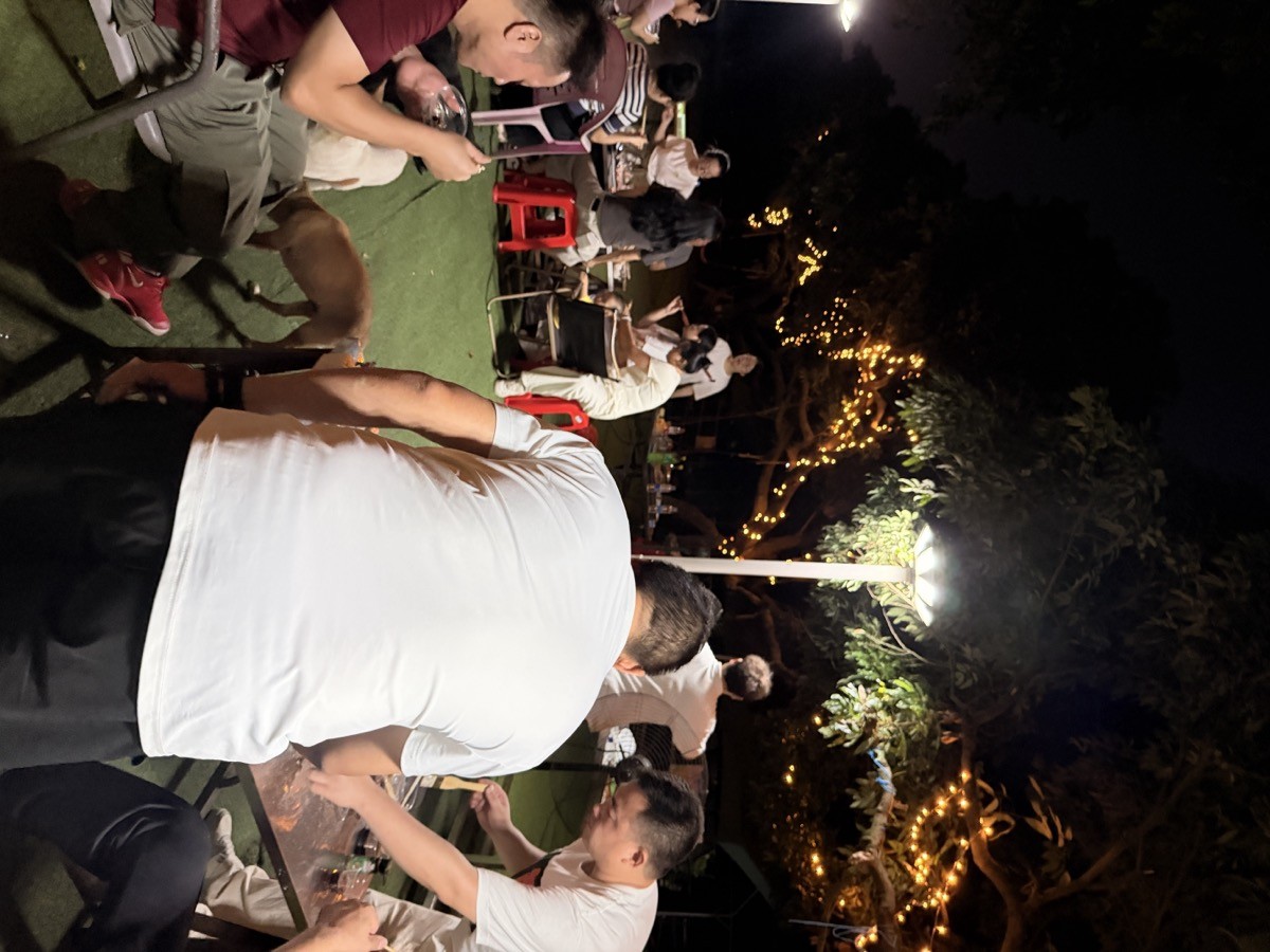 INFULLSAIL team building evening gathering under string lights