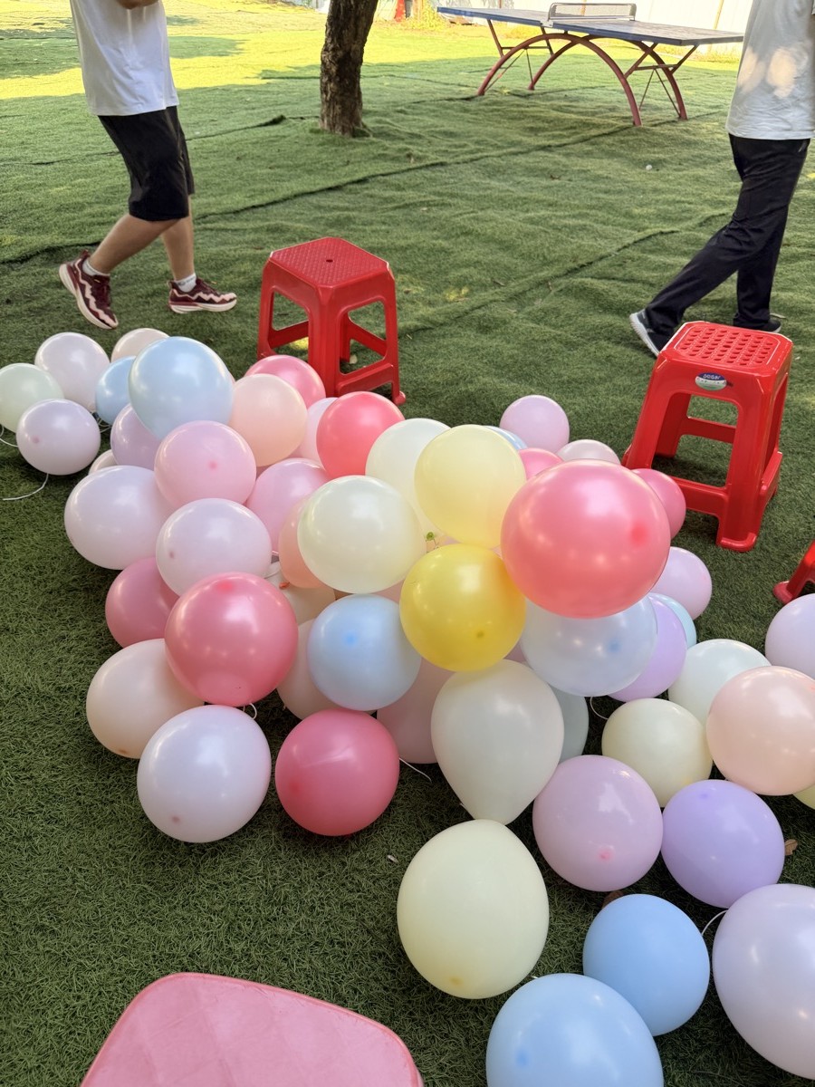 INFULLSAIL team building day games and balloons outdoors