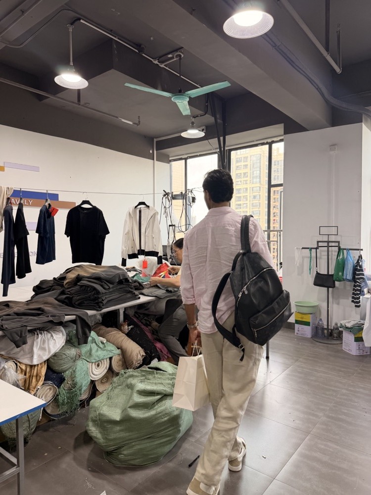 UK brand client visiting a garment workshop at the INFULLSAIL clothing factory in Dongguan