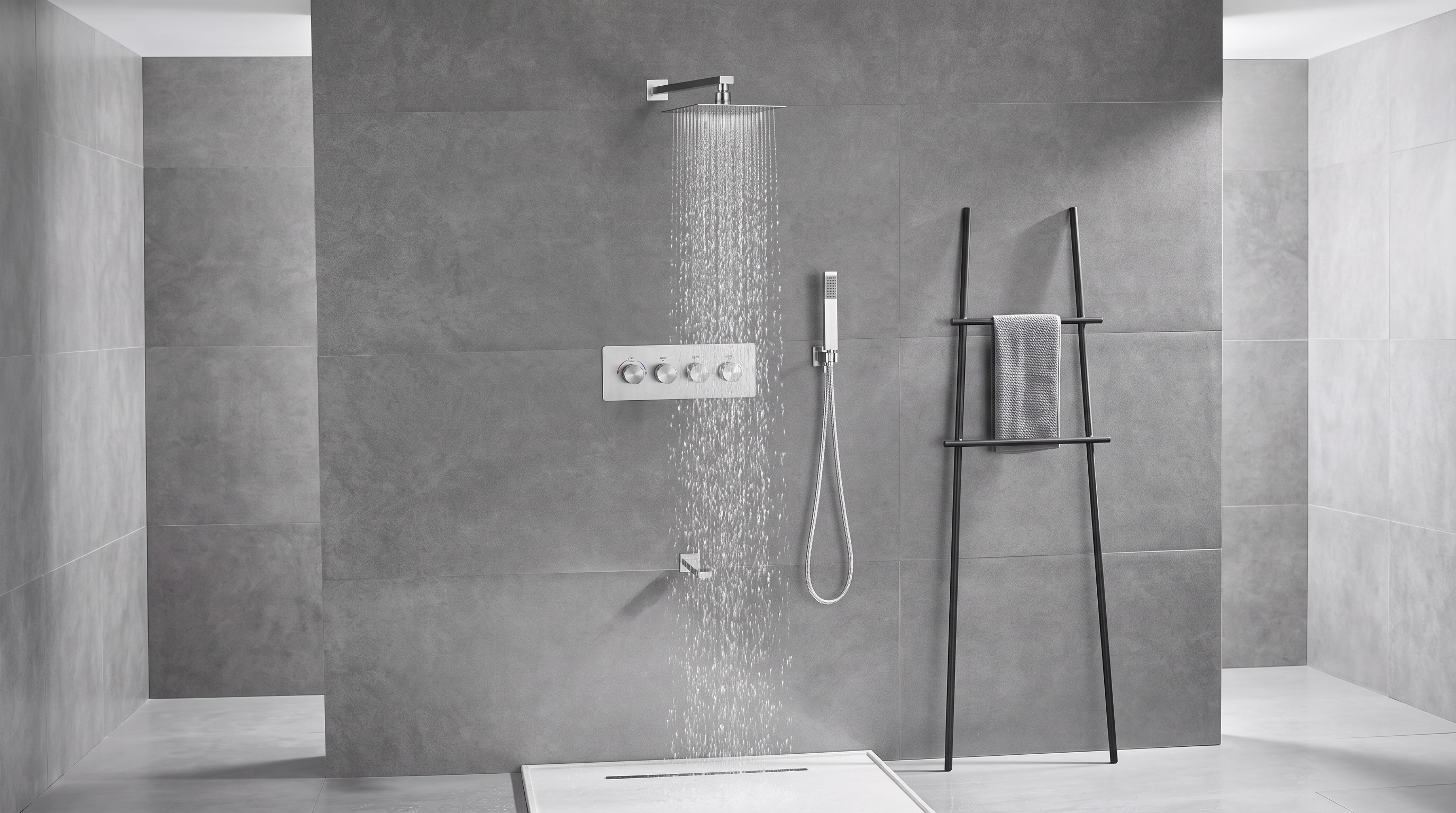 Concealed shower system installed on a tiled wall above a bath, with an overhead head, wall-mounted control plate and bath spout