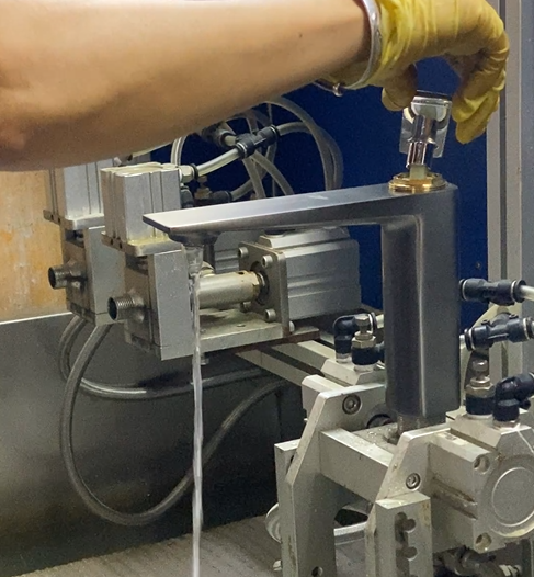 Water-pressure and air-tightness testing of a faucet