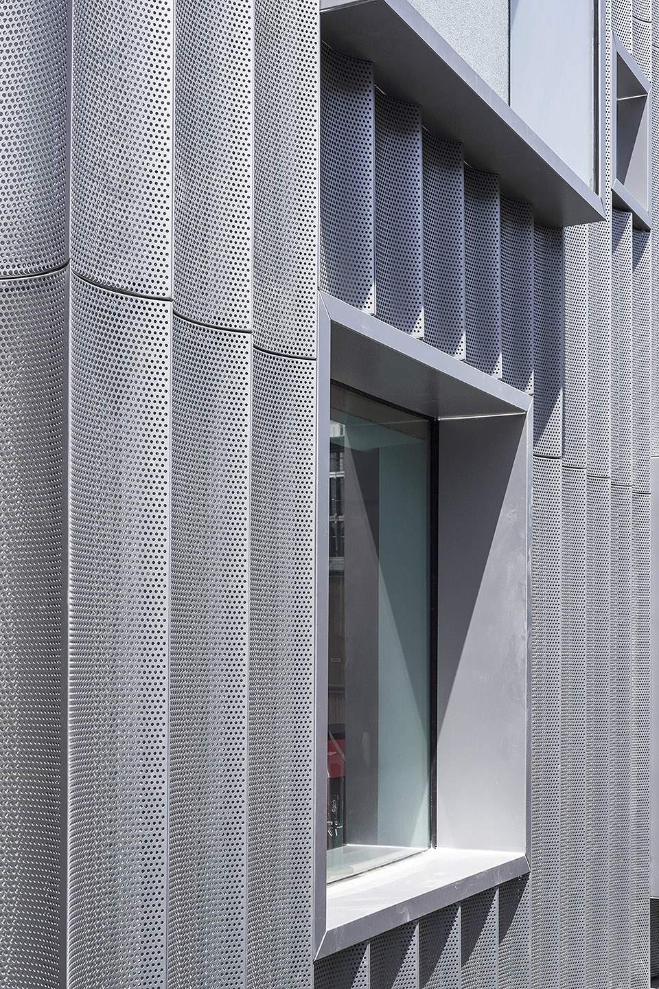 Perforated stainless steel used as an architectural facade layer