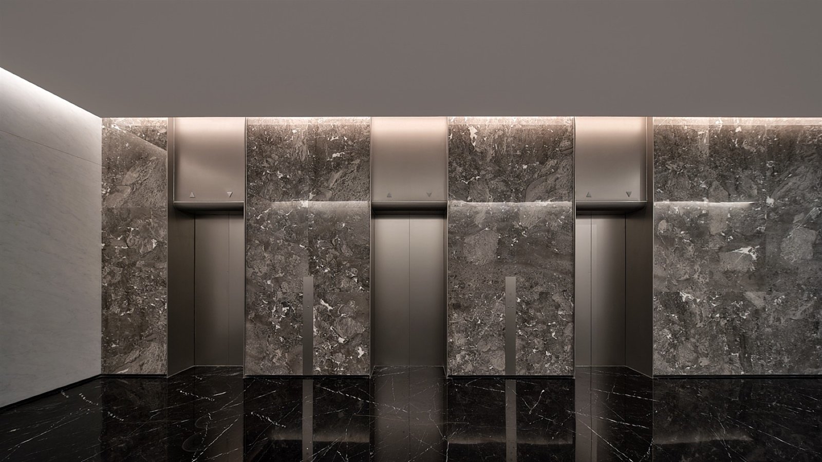 High-end elevator lobby with stainless steel door portals