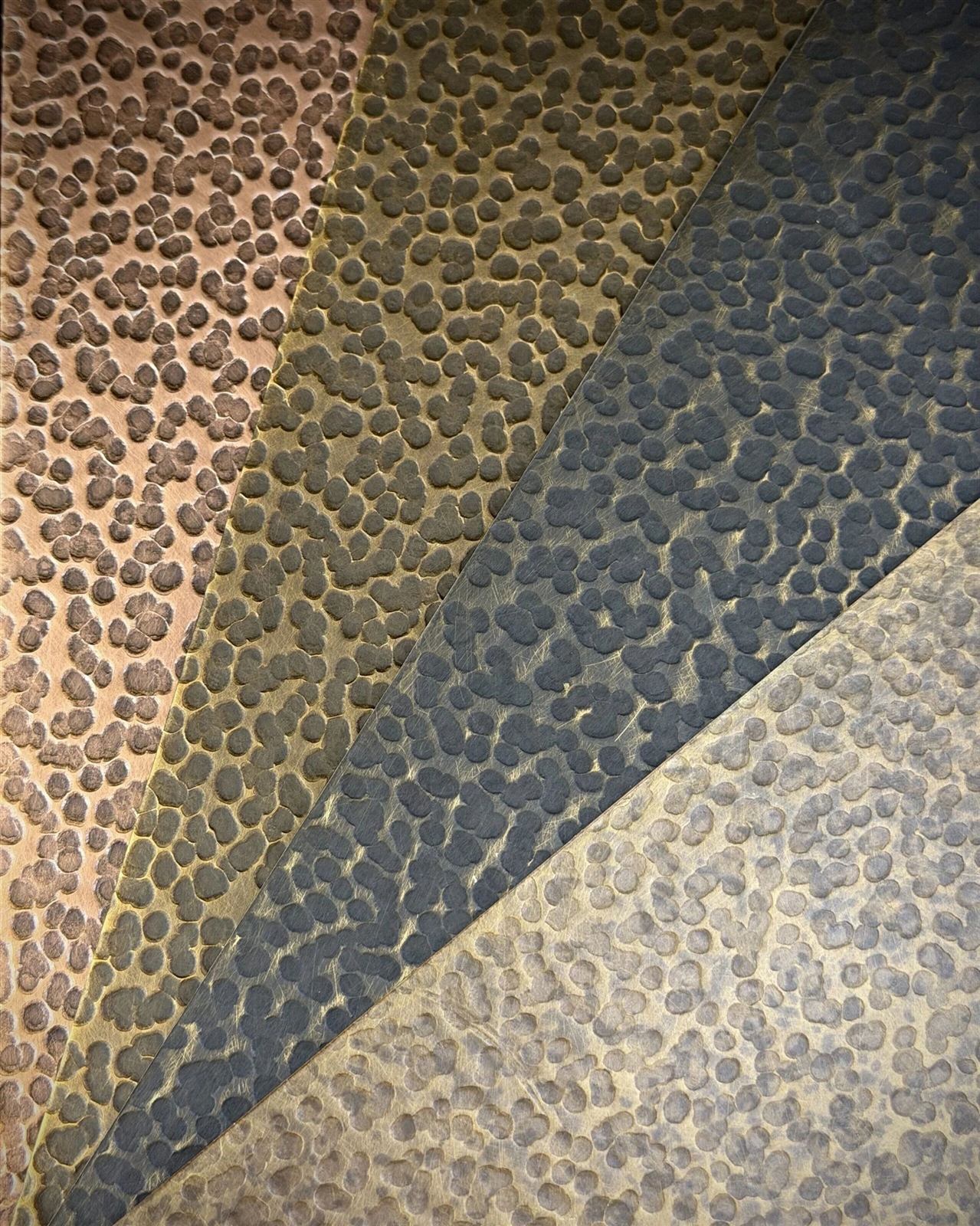 Hammered stainless steel with irregular handcrafted texture